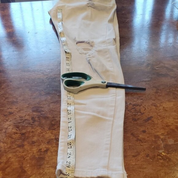 White Skinny HighWaisted Jeans with Distressed Details - Picture 6 of 9